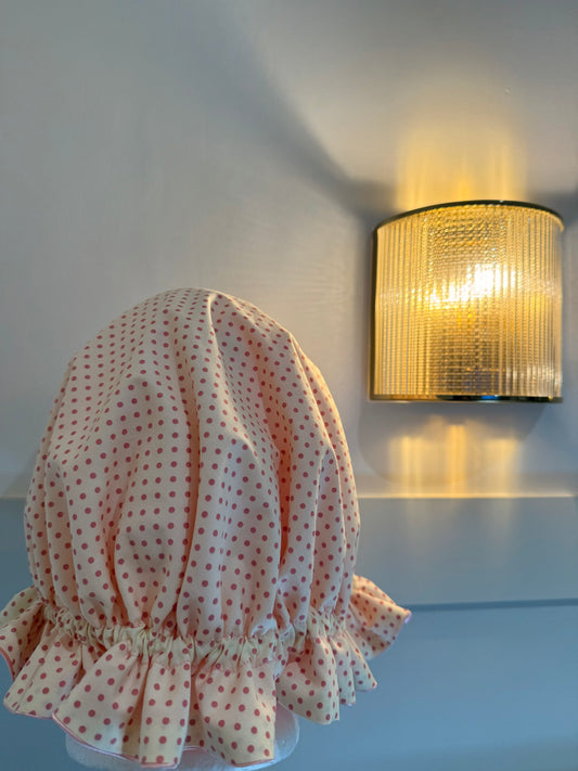 Pretty In Pink Satin Bonnet, with white fabric and light pink polka dots. 